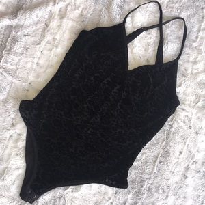 Black semi-sheer velvet body suit